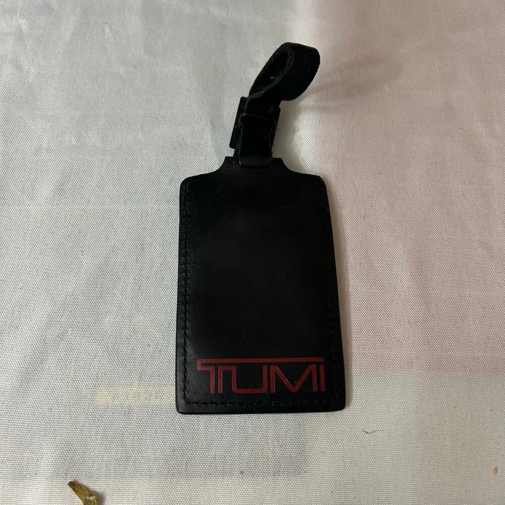 Tumi Alpha Black Leather Luggage Tag Snap Button and Buckle Red Lettering
